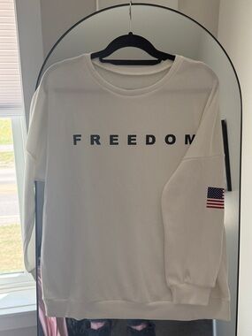 Charli Krik Foundation — White 'FREEDOM' Graphic Sweatshirt with Flag Sleeve